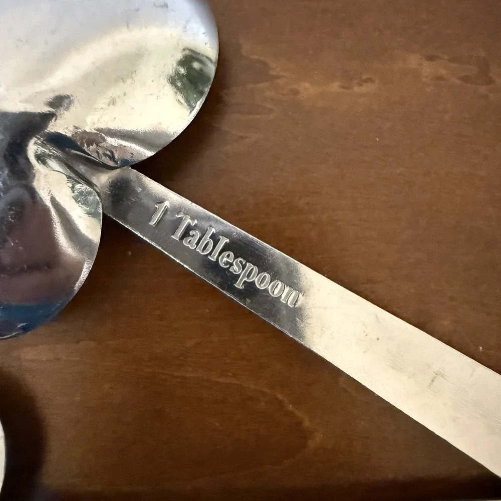 Set of 4 Stainless Steel Heart Shaped Measuring Spoons with Phrases